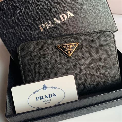 prada saffiano leather bifold wallet ametista 1m0204